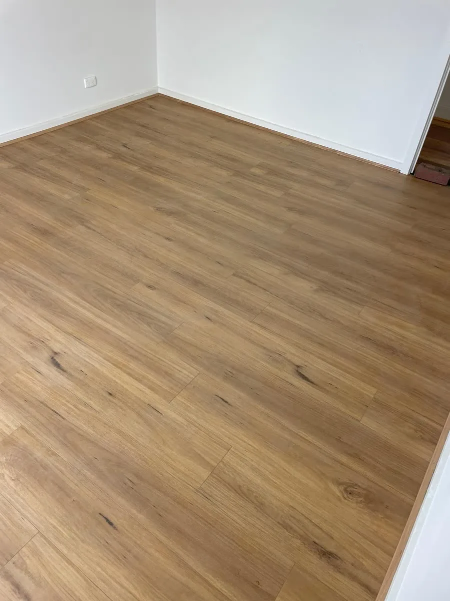 Honey-toned timber-look floor in a Melbourne home