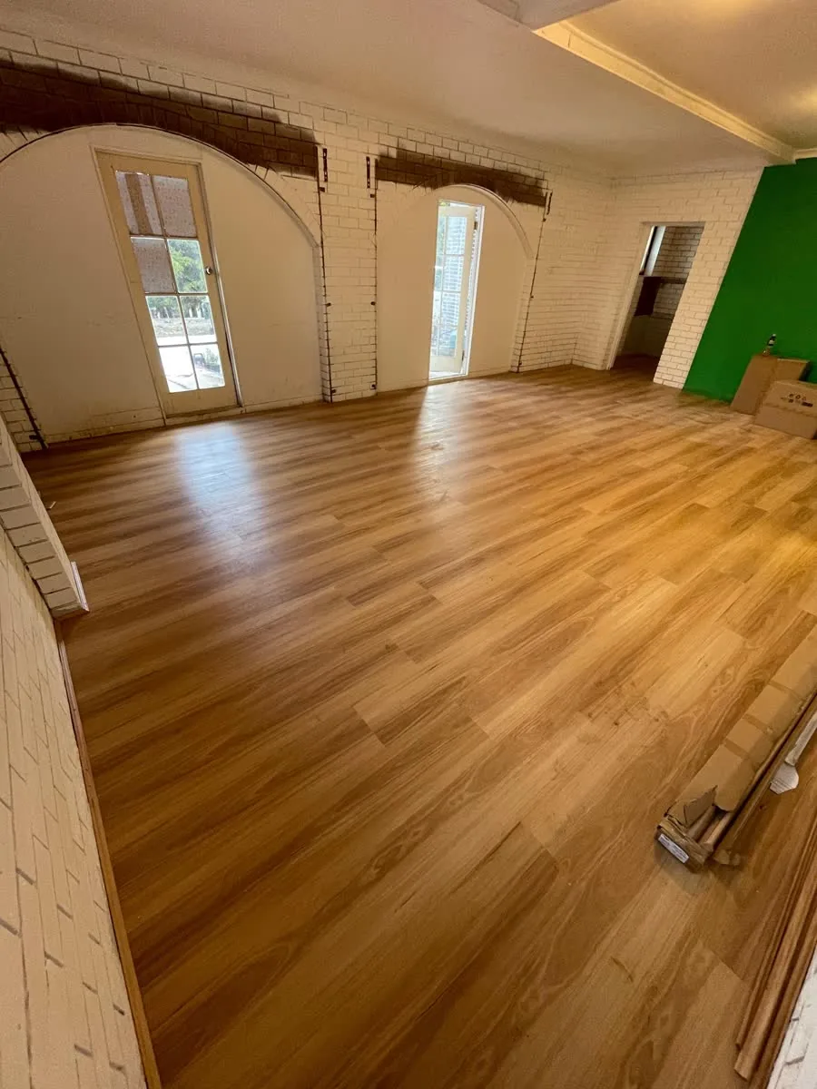 Newly installed floor in a bright open-plan room