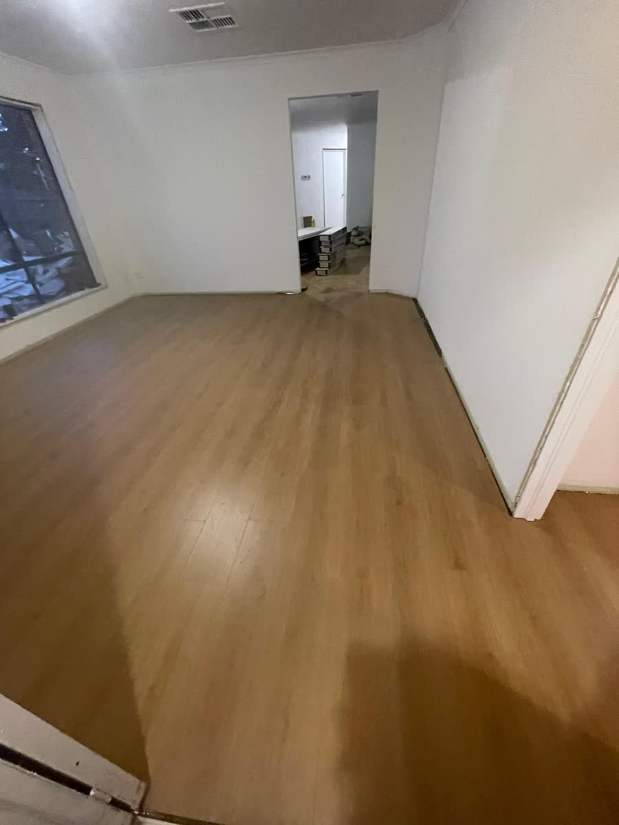Completed flooring in a Melbourne hallway and bedroom