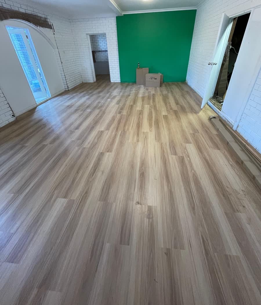 Completed flooring in a large open-plan renovation